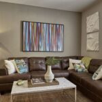 Apartment rental living room with door to balcony - Elements at Prairie Center