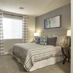 Bedroom with closet space in an apartment rental - Elements at Prairie Center