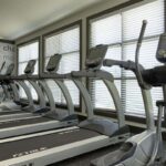 Series of treadmills at an apartment fitness center - Elements at Prairie Center