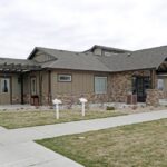 Exterior of an apartment clubhouse - Elements at Prairie Center