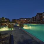 Apartment complex with large pool and hot tub - Elements at Prairie Center