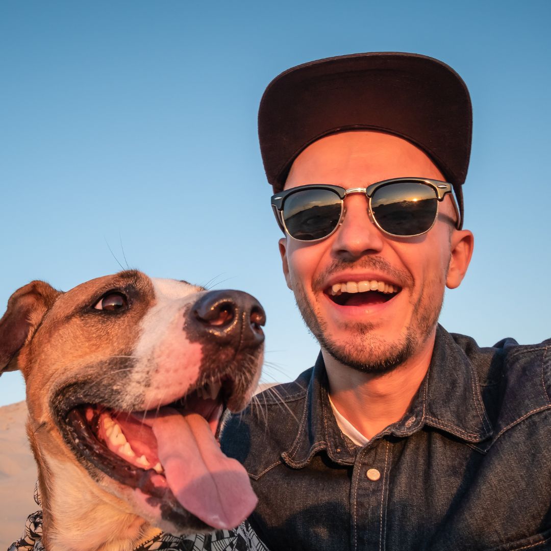 man with dog outside