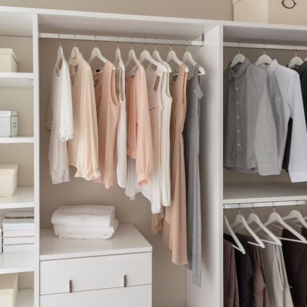 A closet with clothes