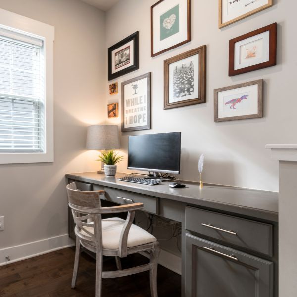 home office with pictures on the wall